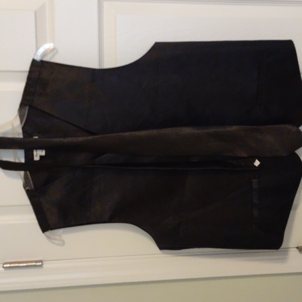 Daniel Ellissa black vest and neck tie